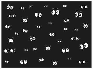 Glowing in the dark cat eyes black background