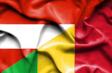 Waving flag of Mali and Austria
