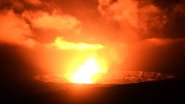  Astrophotography time lapse footage with zoom out motion of stars over active Halemaumau Crater of Kilauea Volcano in Hawaii Volcanoes National Park, Hawaii