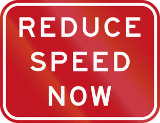 An Australian road sign: Reduce speed now