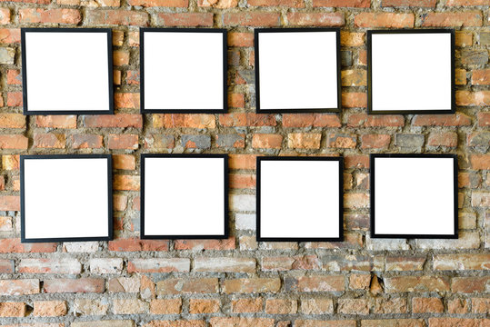 Blank black frames old on old brick wall
