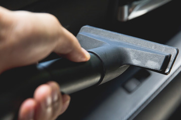 Car vacuuming close up