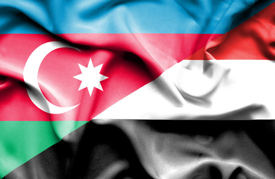 Waving flag of Yemen and Azerbaijan