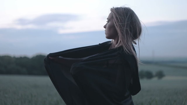 sexy woman  wearing lingerie in the nature during sunset  