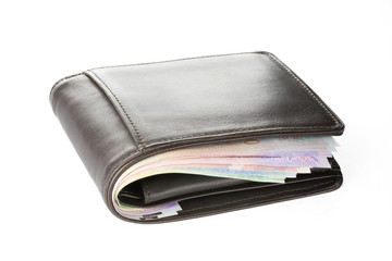 Wallet with money isolated on white background.