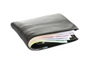 Wallet with money isolated on white background.