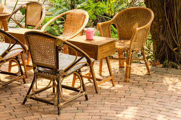 Rattan chairs and wood table