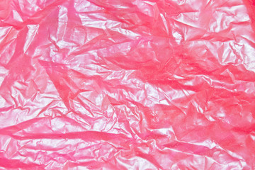 Red crumpled plastic, backgrounds and textures