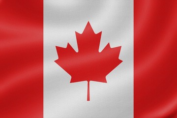 Obraz premium Canada flag on the fabric texture background