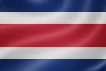 Obraz premium Costa Rica flag on the fabric texture background