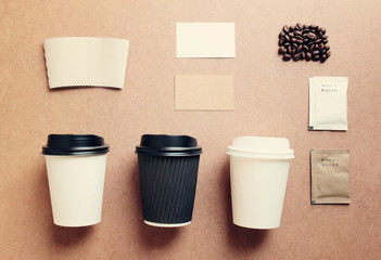 Paper coffee cup mock up for identity branding from top view wit