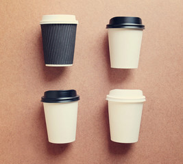 Paper coffee cup mock up for identity branding with retro filter