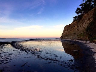 Beach view with reflection at dusk