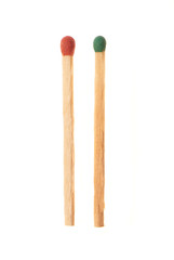 Green and red wooden matches isolated on white background