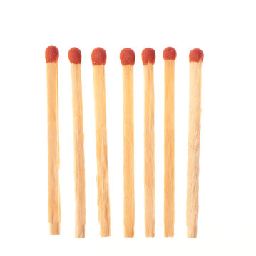 Set of seven red wooden matches isolated on white background