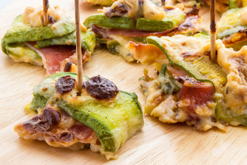 Zucchini and bacon rolls baked