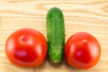 Cucumber and tomato with measuring