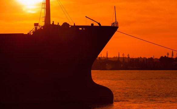 Big industrial cargo ship bow silhouette