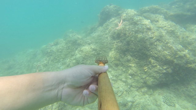 Thai moken hunting underwater 
