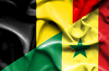 Waving flag of Senegal and Belgium