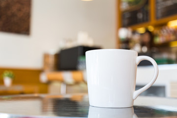 Coffee cup on table in cafe