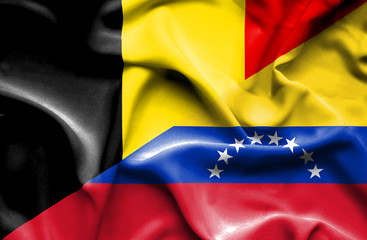 Fototapeta premium Waving flag of Venezuela and Belgium