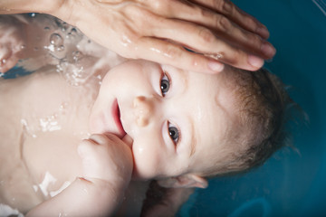 cute baby bathing