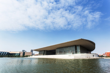 modern building and sky with pond