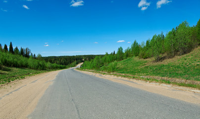 Russian rural landscape with roa
