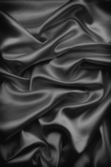 abstract background luxury cloth or liquid wave or wavy folds of grunge silk texture satin velvet material or luxurious