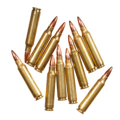 5.56x45mm NATO intermediate cartridges isolated on white.