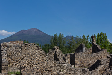 Excavated ruins of Pompeii and Mount Vesuvius in the background