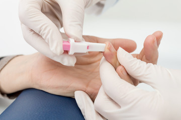 Obraz na płótnie Canvas Blood test from finger