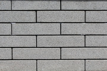 Grauer Backsteinhintergrund