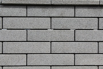 Grauer Backsteinhintergrund