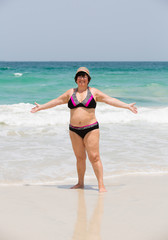 woman retired on the beach