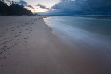 Beautiful seascape with Baltic sea shore after sunset