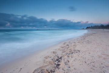 Beautiful seascape with Baltic sea shore after sunset