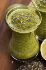 Healthy green fresh fruit and vegetable juice smoothie with chia