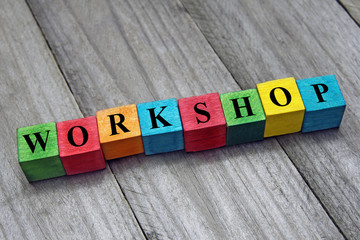 word workshop on colorful wooden cubes
