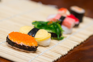 delicious sushi on bamboo mat