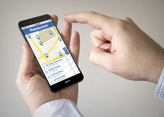  touchscreen smartphone with restaurant seeker on the screen