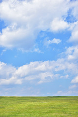 green hill with blue sky