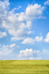 green hill with blue sky