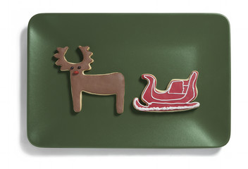 Christmas cookies on green plate
