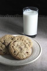 Chocolate raspberry cookies and a glass of milk
