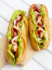 hot dogs on a wooden table