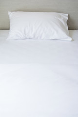 Fototapeta na wymiar Comfortable soft pillows on the bed