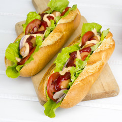 hot dogs on a wooden table