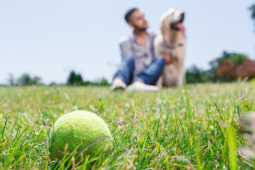 Golden retriever and his owner  